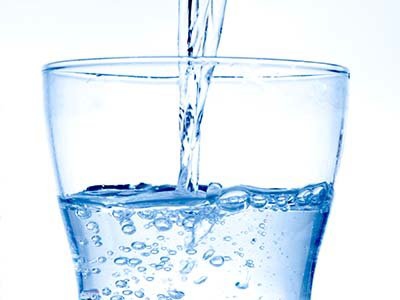 Water pouring into a glass